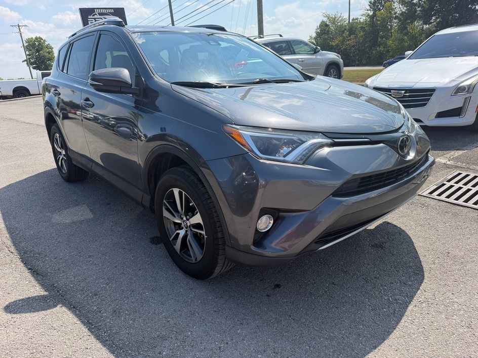2018 Toyota RAV4 Adventure/XLE — rebuilt & branded title, 21% below market